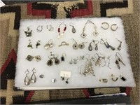 APPROXIMATELY 30 WOMANS STERLING SILVER EARRINGS