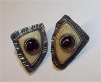Pair Of Sterling Silver Earrings With Red Stones