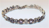 Sterling Silver Bracelet With Purple Stones