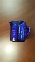 Blue measuring cup
