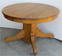 Round Wood Pedestal Dining Table on Wheels