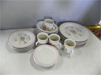 Four place set of dishes