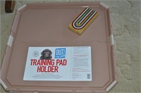 NEW PET TRAINING PAD HOLDER AND CRIBBAGE BOARD