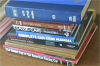 STACK OF ASSORTED CAR BOOKS