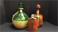GREEN GLASS JUG + 2 LEATHER WRAPPED LIQUOR BOTTLES