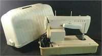 Vintage Singer sewing machine in a case