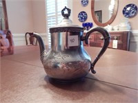 Antique Tea Pot with Ornate Features at Spout