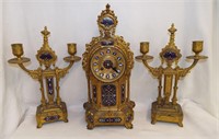 Brass And Enamel Decorated Three Piece Clock Set