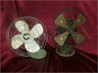 Two antique fans