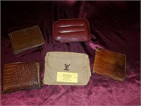 Gucci, Loui Vuitton, Cole Haan, and more wallets