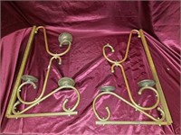 Two old brass wall mounted candle holders