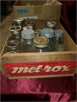 Old mason jars and an old California fruit box