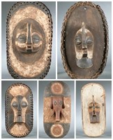 5 Kifwebe style masks on shields. 20th century.
