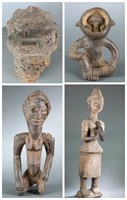 Three African seated figures. 20th century.