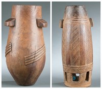 2 Zulu wooden milk jugs. 20th century.