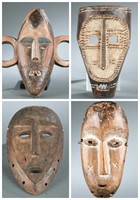 4 African style masks. 20th century.