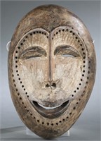 Lega style Bwami society wood mask. 20th century.
