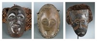 3 African masks. 20th century.