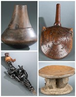 4 Wooden African objects. 20th century.