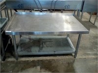 Stainless table, approximately 26" X 48" X 32"