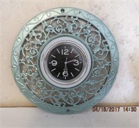 Battery operated quartz clock mounted in 16"