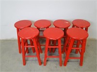 Seven Red Barstools.