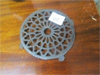 Cast Iron 4 Footed Tip Trivet