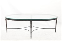 Oval metal base glass top table