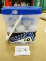 Tub of Titleist AAA Golf Balls
