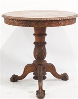 Round mahogany claw table
