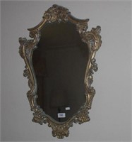 Small ornate gilt framed mirror