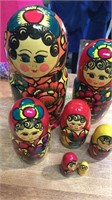 One Russian painted wood nesting doll with 7