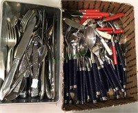 Two boxes of flatware stainless steel and plastic