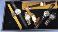 Seven men's watches with bands