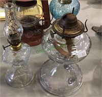 Two antique glass oil lamps , one small size and