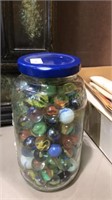 Jar of marbles including shooters might be