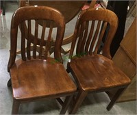 Two heavy solid wood side chairs , great for the