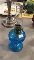 Small blue glass oil lamp with font and shade,