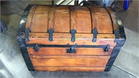 Large antique hump back trunk with original metal