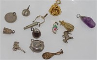 Various charms including silver