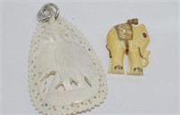 Two elephant pendants