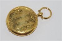 Vintage engraved gilt metal locket