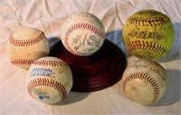 Lot of 5 Baseballs and one Wood Ball Holder