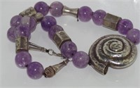 Unusual large silver and amethyst necklace