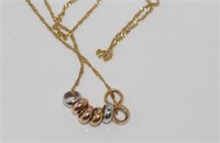 9ct yellow gold chain with tri-colour gold rings