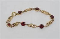 9ct yellow gold and garnet bracelet