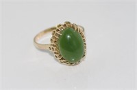 9ct yellow gold ring with green stone