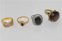Two 10ct yellow gold stone set rings