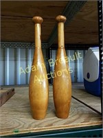 Two solid wood juggling batons