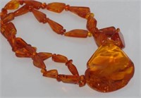 Honey amber necklace with large pendant
